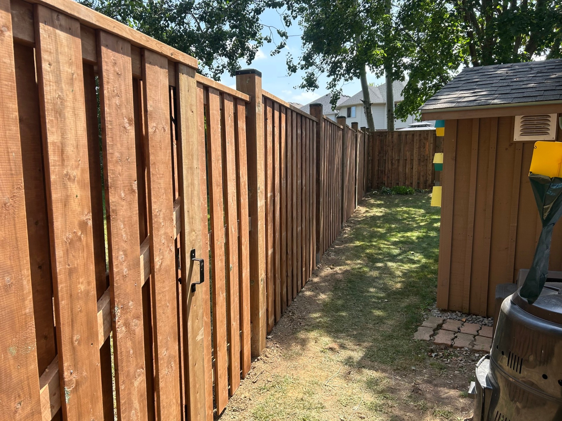 Wood fence with gate installation in Scarborough